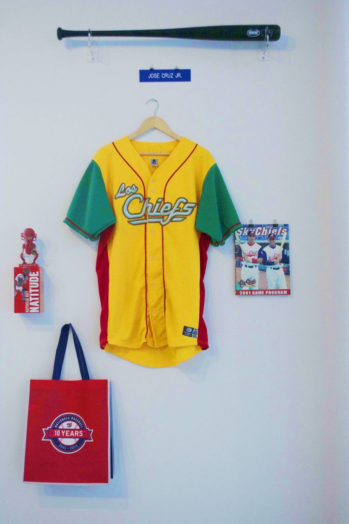 Chiefs baseball gear on a wall.
