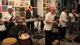 Henry Rosado (third from the right) and Grupo Boricua performing at La Casita in 2017.